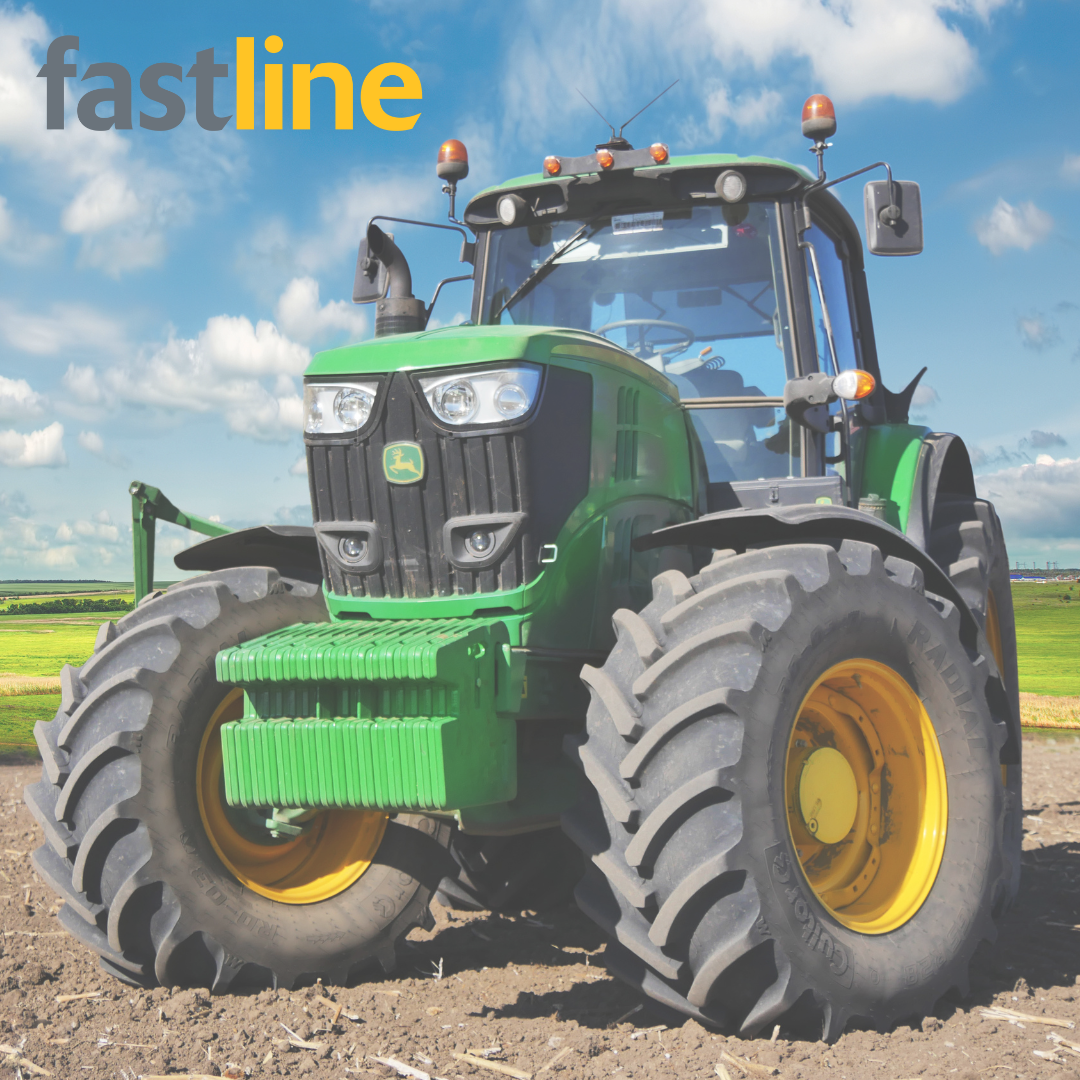 Semi-transparent image of a green John Deere tractor with the Fastline logo in the top left