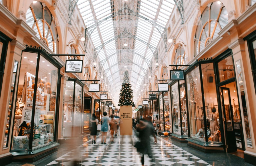 An ornate shopping mall interior with Christmas decorations
