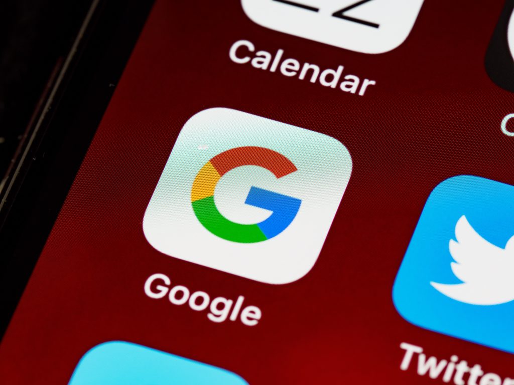 A smartphone screen showing the homepage that has the Google app icon on it