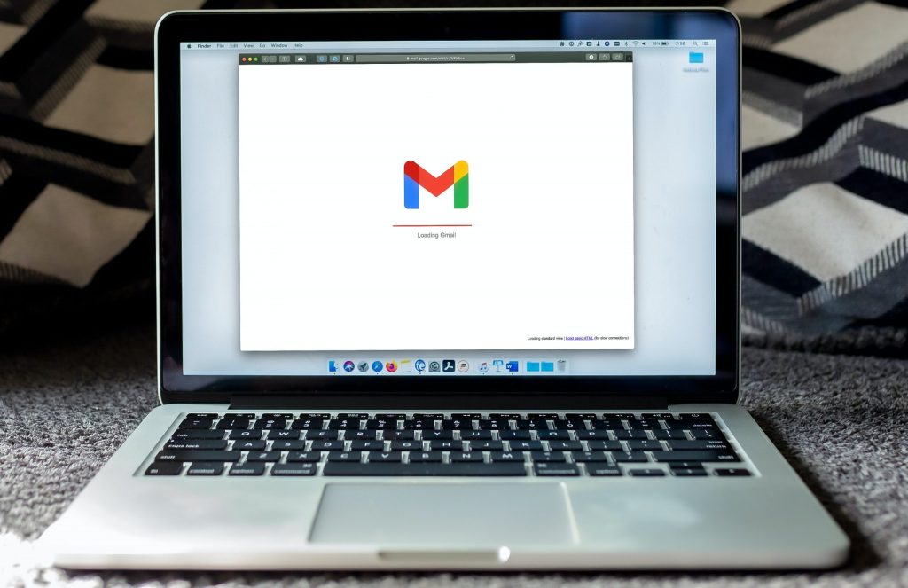 A Mac computer open to a login page for Gmail